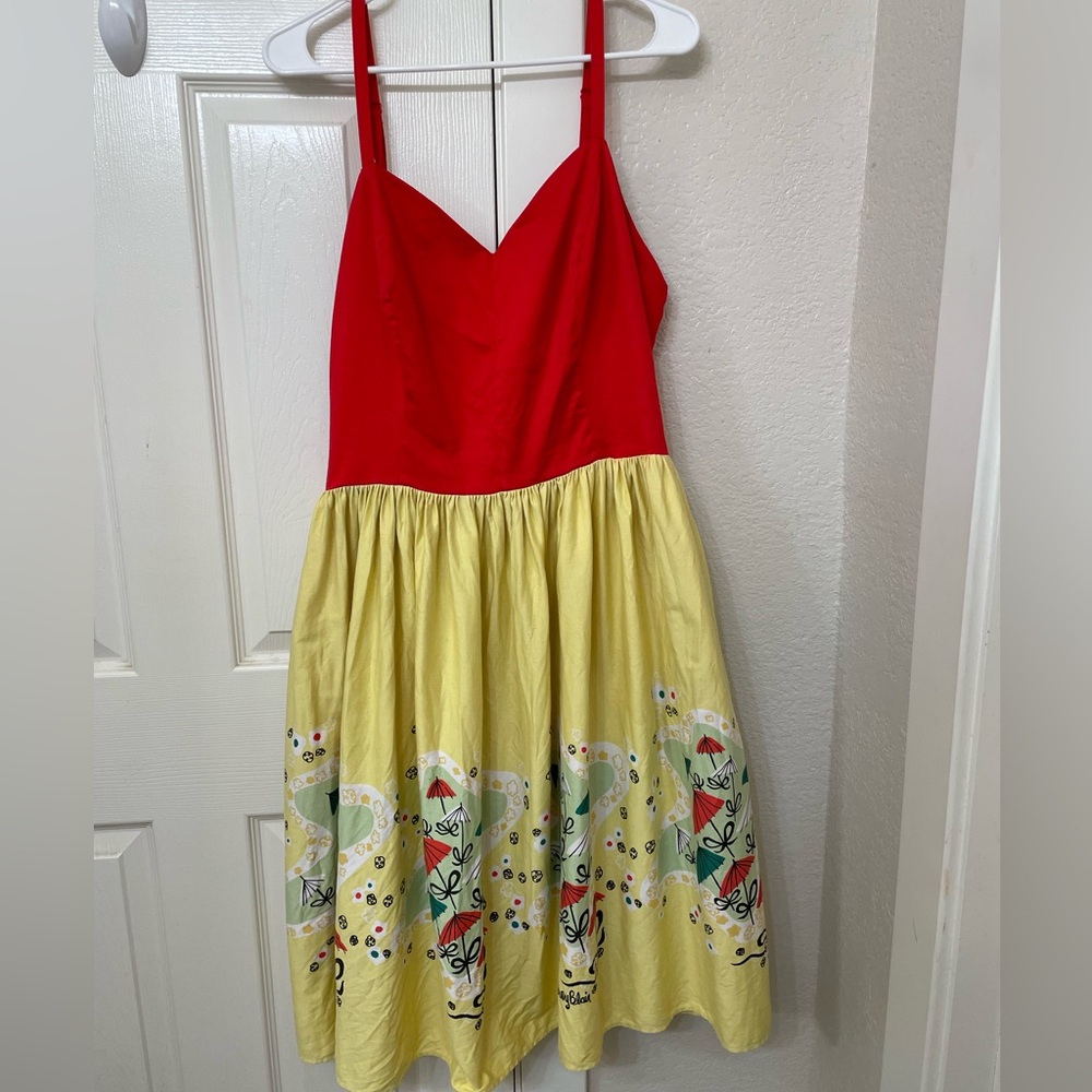 Pinup Couture Audrey Dress in Mary Blair Umbrella Print.